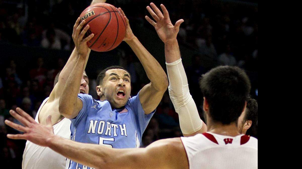 
North Carolina guard Marcus Paige underwent surgery to remove bone spurs from his right ankle, the university announced on Monday.
