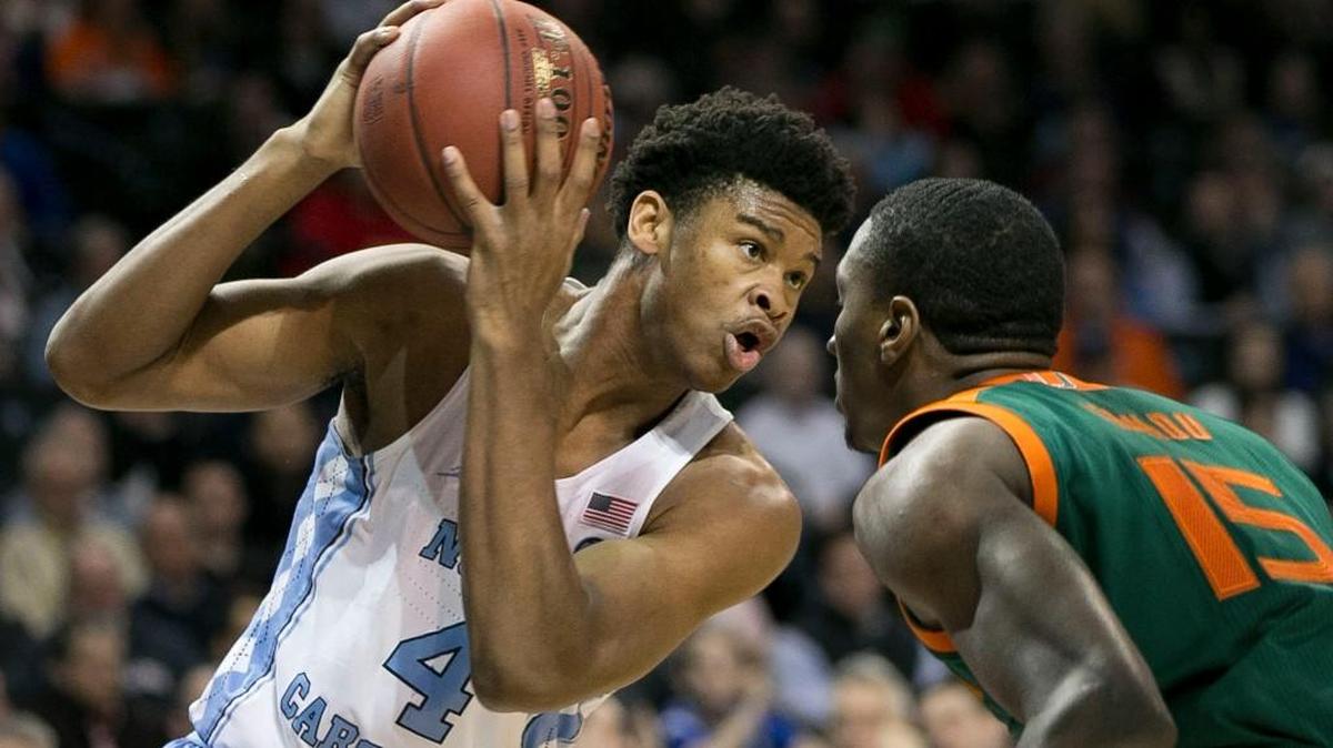 UNC’s Isaiah Hicks, left, faces off against Miami’s Ebuka Izundu, right, during the Tar Heels 78-53 win over Miami on Thursday in the ACC tournament. Hicks led North Carolina with 19 points.