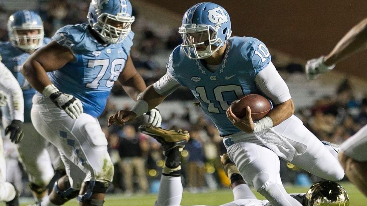 UNC quarterback Mitch Trubisky (10) scores on a 10-yard run in the fourth quarter of the Tar Heels’ 50-14 win over Wake Forest on October 17, 2015.