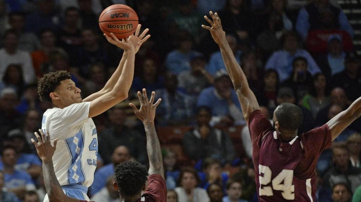 UNC’s Justin Jackson fires up a 3-pointer in the first half as Texas Southern’s Marvin Jones (24) defends at the NCAA tournament at the Bon Secours Wellness Arena in Greenville, S.C.