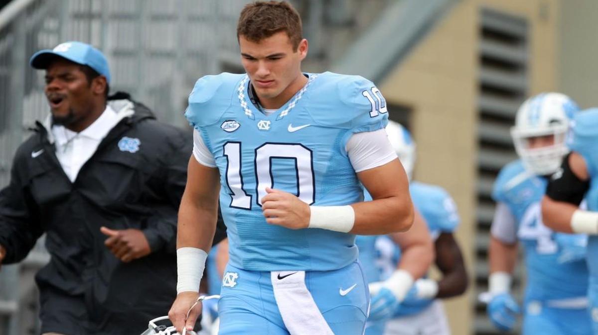 North Carolina quarterback Mitch Trubisky (10) and his teammates enter Bobby Dodd Stadium for the Tar Heels’ game against Georgia Tech.