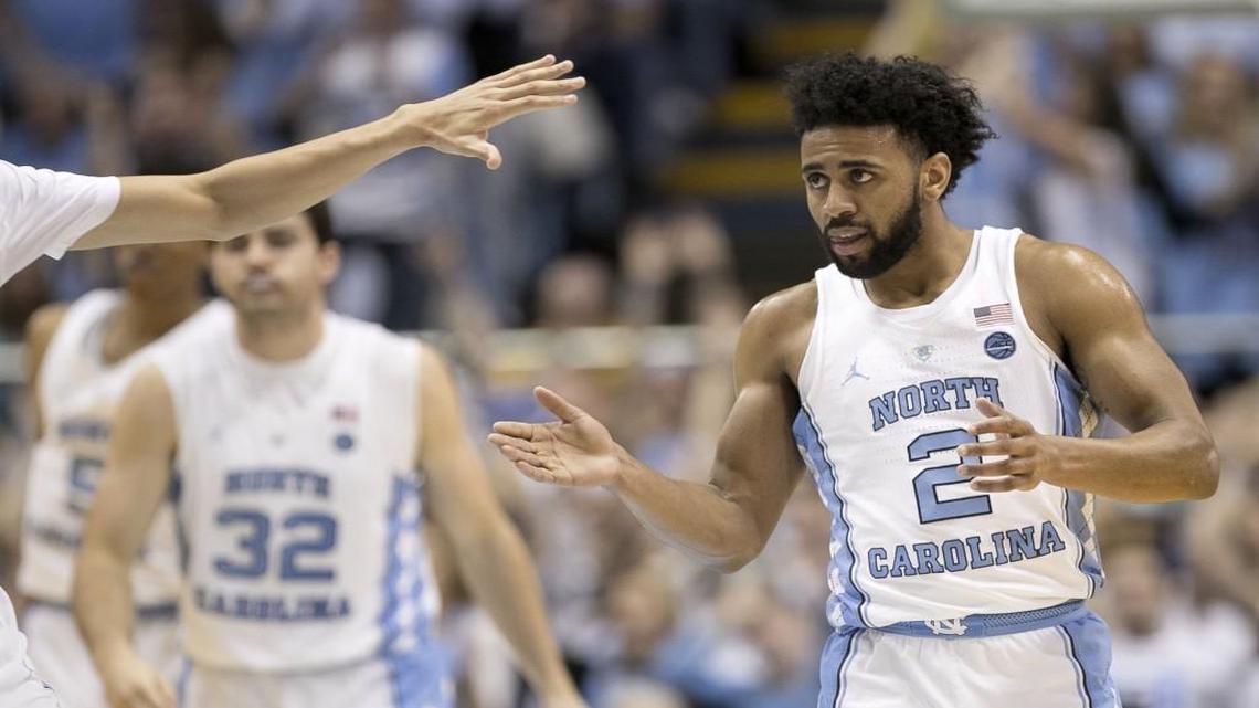 North Carolina’s Joel Berry applauds after scoring 19 points in the first half against Duke at the Smith Center in Chapel Hill.