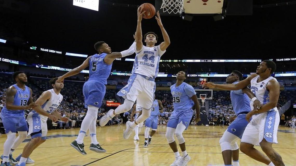 UNC’s Justin Jackson (44) goes to the basket against Tulane’s Cameron Reynolds (5) during the second half at the Smoothie King Center in New Orleans.