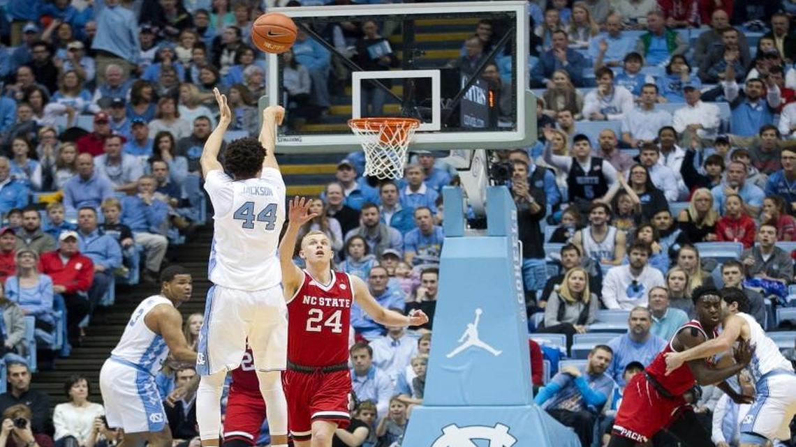 North Carolinas Justin Jackson (44) launches a 3-point shot over N.C. State’s Maverick Rowan (24) during the first half at the Smith Center. Jackson hit 6 of 11 3-point attempts and led all scorers with 21 points in the Tar Heels' 107-56 victory.