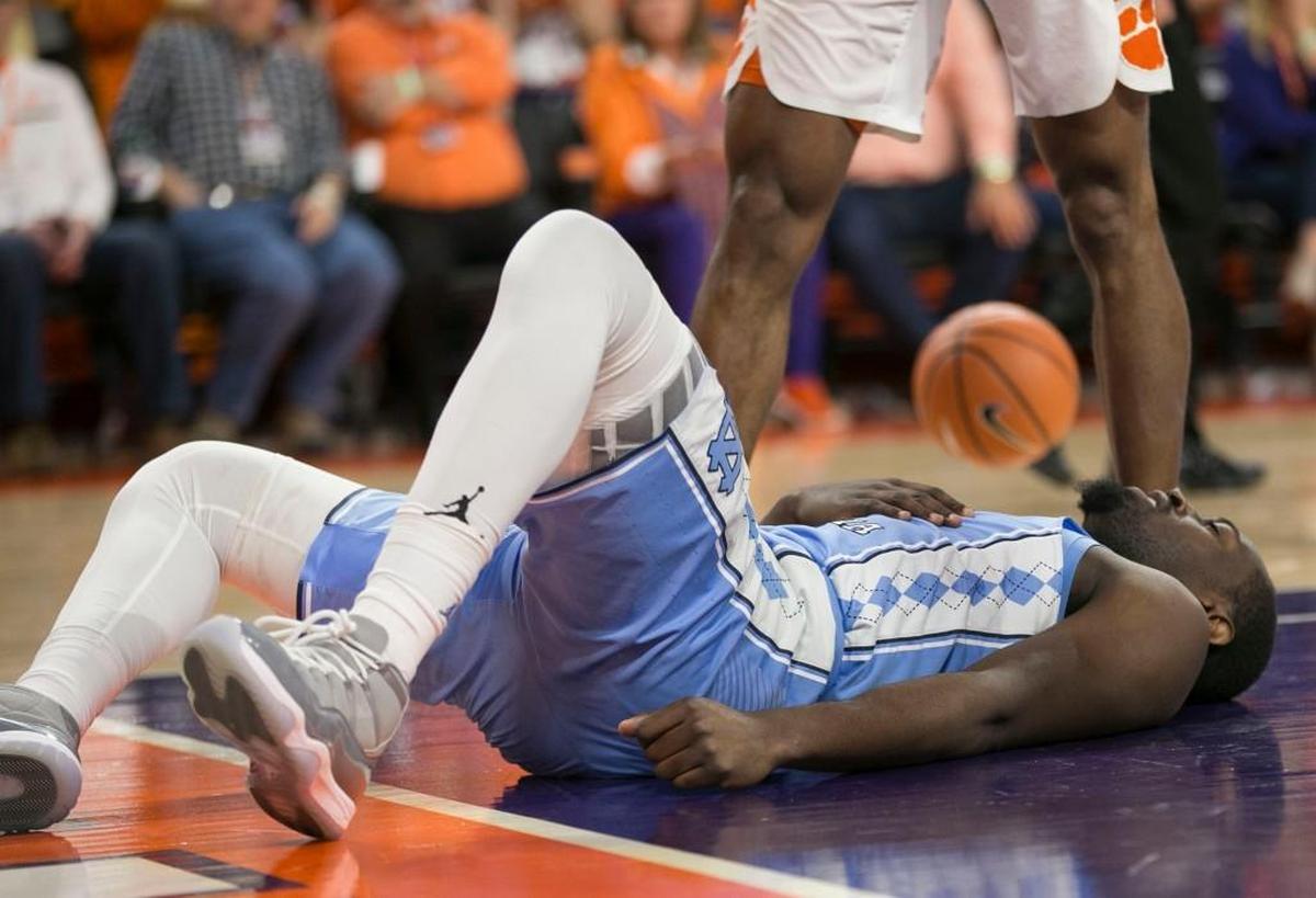 North Carolina’s Theo Pinson (1) reacts after falling early in the first half against Clemson on Tuesday, January 30, 2018 at Littlejohn Coliseum in Clemson, S.C. Pinson injured his hip and shoulder on the fall and did not return to play.