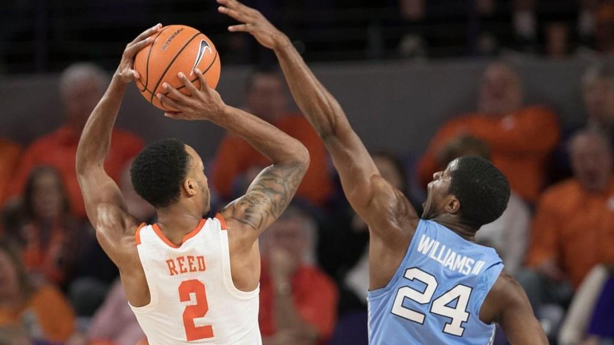 North Carolina’s Kenny Williams (24) defends Clemson’s Marcquise Reed (2) during the second half on Tuesday, January 30, 2018 at Littlejohn Coliseum inn Clemson, S.C. Reed lead Clemson with 20 points in their 82-78 victory over North Carolina.