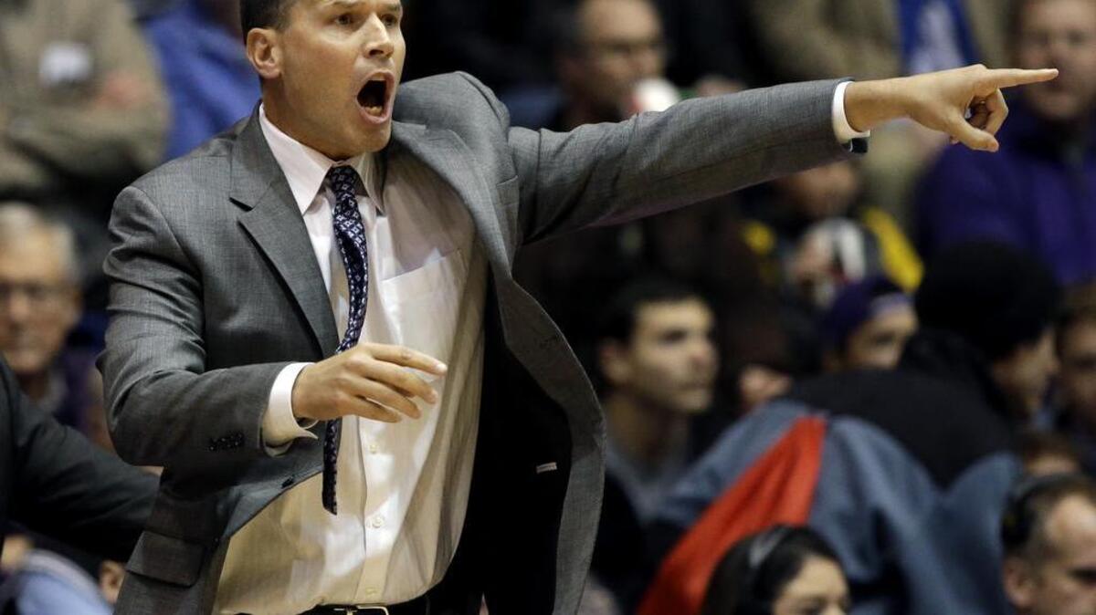 Northwestern coach Chris Collins directs his players against Columbia on Nov. 20. The Tar Heels face Collins and Northwestern tonight in the Hall of Fame Classic in Kansas City.