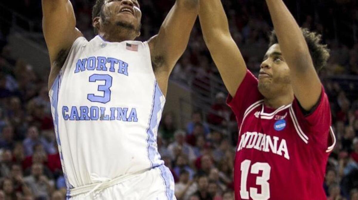 North Carolina’s Kennedy Meeks, left, drives to the basket against Indiana’s Thomas Bryant on Friday.