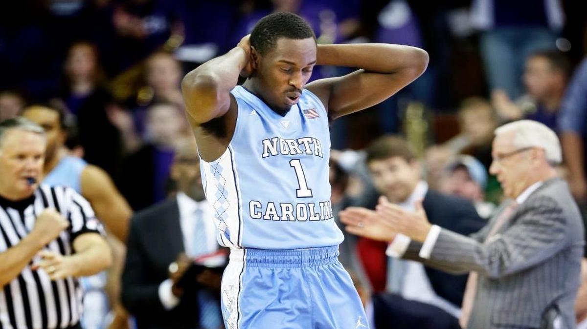 North Carolina forward Theo Pinson (1) reacts after being called for a foul during the second half of an NCAA college basketball game against North Carolina, Saturday, Nov. 21, 2015, in Cedar Falls, Iowa. Northern Iowa won 71-67. (AP Photo/Charlie Neibergall)