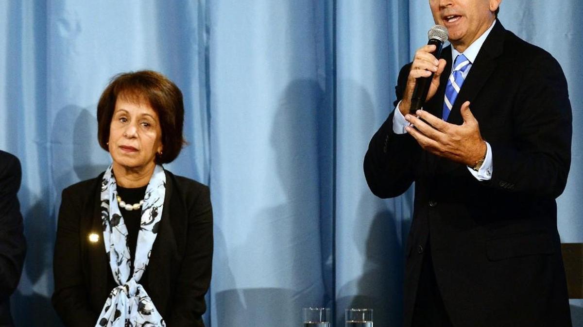 UNC Chancellor Carol L. Folt listens as Bubba Cunningham, UNC-Chapel Hill athletic director, answers a question about future NCAA sanctions in 2014.