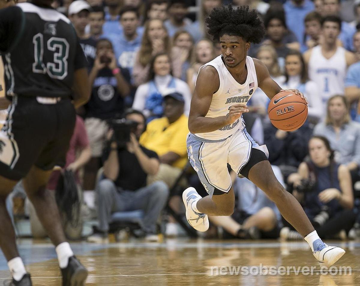 North Carolina freshman Coby White (2) starts a fast break during the first half of the Tar Heels’ exhibition game against Mt. Olive on Friday, November 2, 2018 at the Smith Center in Chapel Hill, N.C.