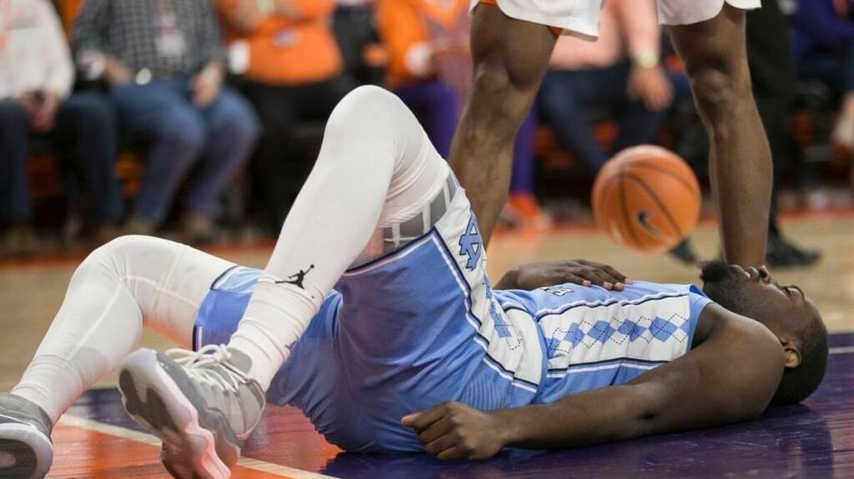 North Carolinas Theo Pinson (1) reacts after falling early in the first half against Clemson on Tuesday, January 30, 2018 at Littlejohn Coliseum in Clemson, S.C. Pinson injured his hip and shoulder on the fall and did not return to play.