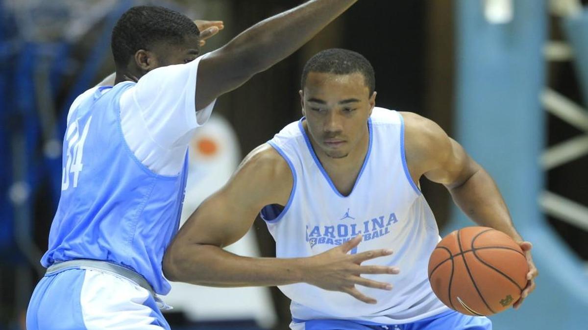 
UNC's Brice Johnson drives around Toby Egbuna during the Tar Heels’ practice at the Smith Center in Chapel Hill.
