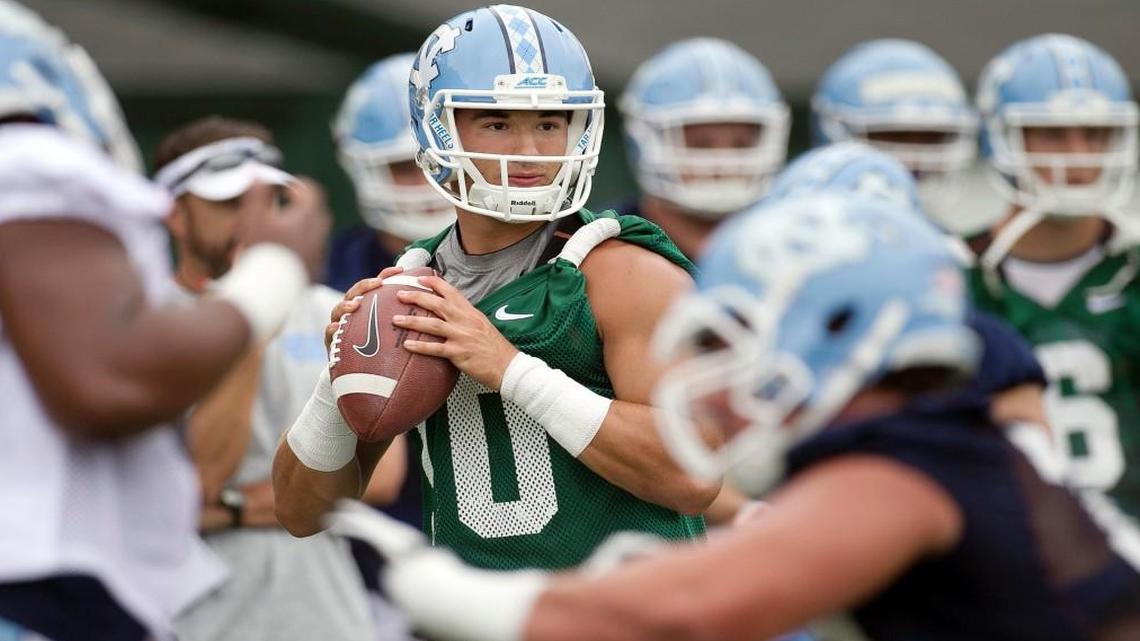 North Carolina quarterback Mitch Trubisky (10) runs the offense on the first day of practice for the Tar Heels at Navy Field on Friday, August 5, 2016 in Chapel Hill, N.C.