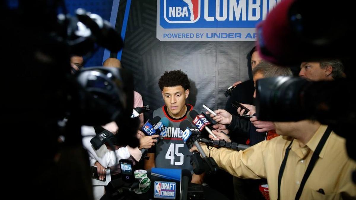 Justin Jackson is swarmed by the media at the NBA draft combine on May 11.