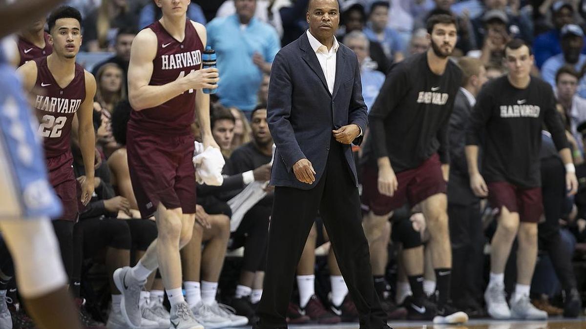 Harvard coach Tommy Amaker steps to the court after calling a time out in the second half against North Carolina on Wednesday, January 2, 2019 at the Smith Center in Chapel Hill, N