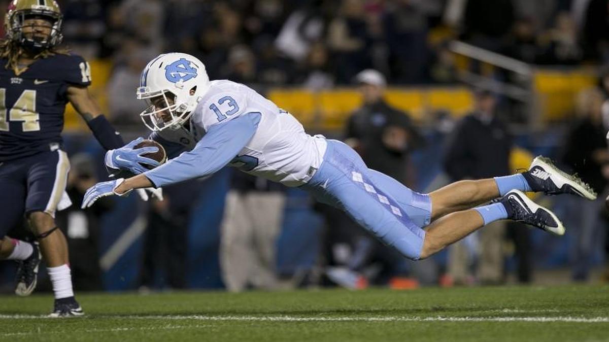 North Carolina’s Mack Hollins dives into the end zone for a touchdown on a 32-yard pass from quarterback Marquise Williams in the second quarter against Pittsburgh at Heinz Field.