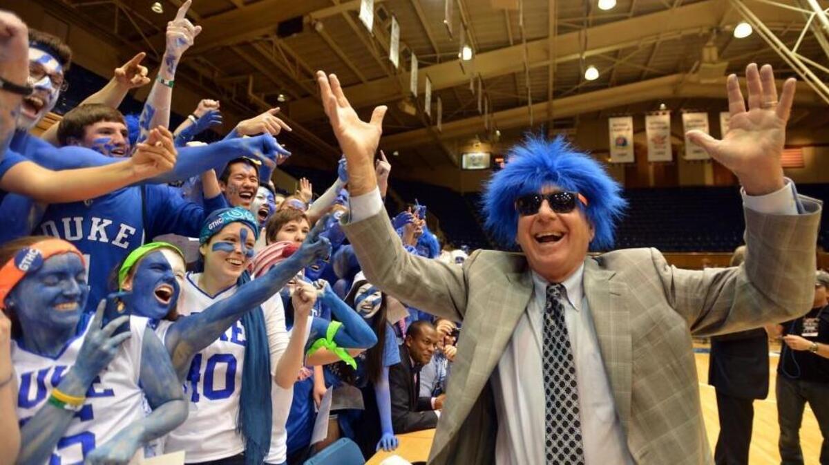 Television personality Dick Vitale greets the Cameron Crazies prior to the start of the UNC game. Duke battled UNC at Cameron Indoor Stadium Saturday, March 8, 2014 in Durham, N.C.