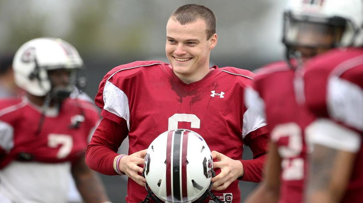 
South Carolina’s quarterback Connor Mitch laughs during practice on March 15, 2015.
