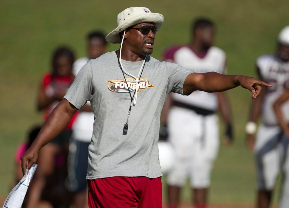 Shaw head football coach Adrian Jones directs his team during tpractice in 2016.