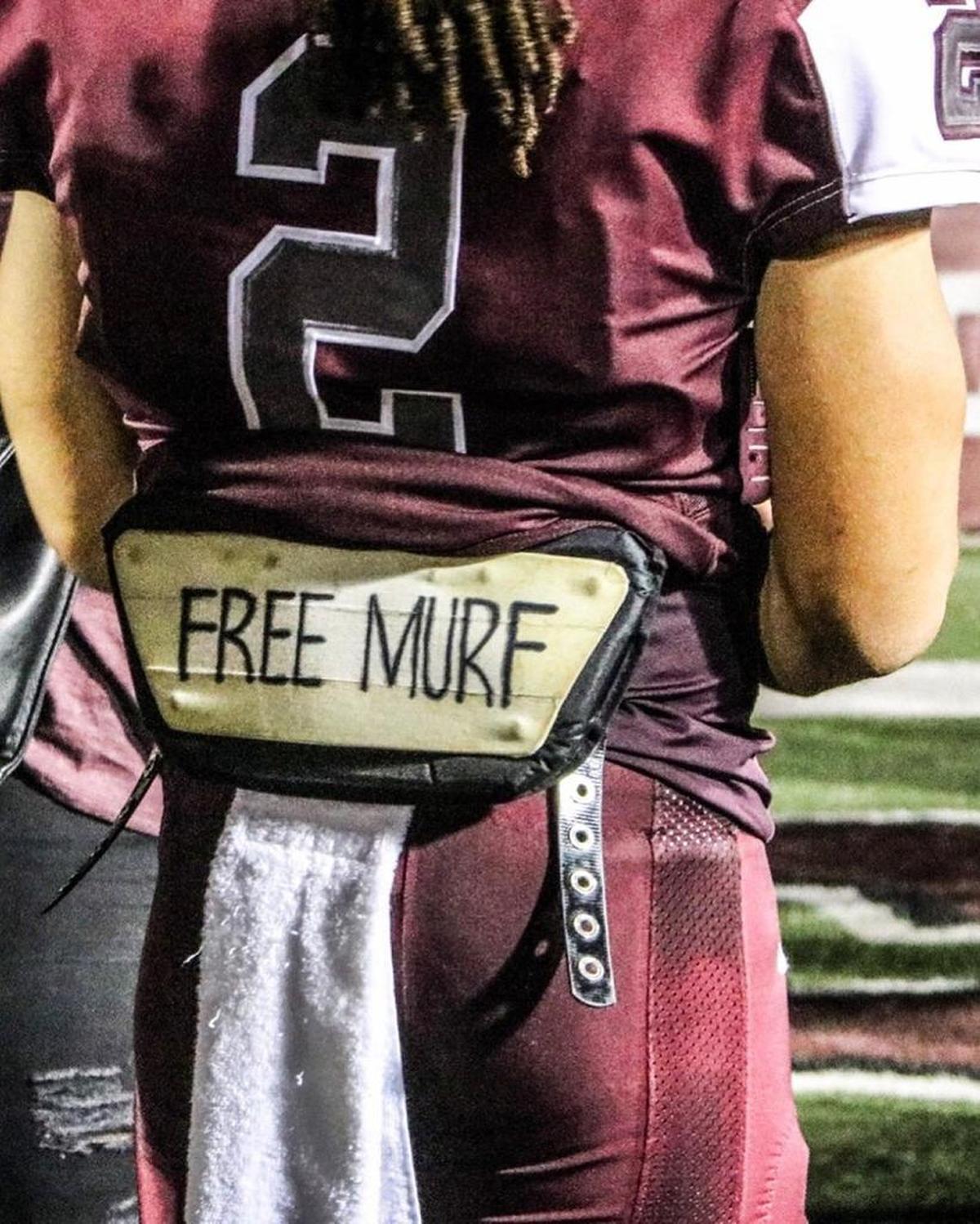 N.C. Central wide receiver Jacen Murphy writes ‘Free Murf’ on his equipment for each game.