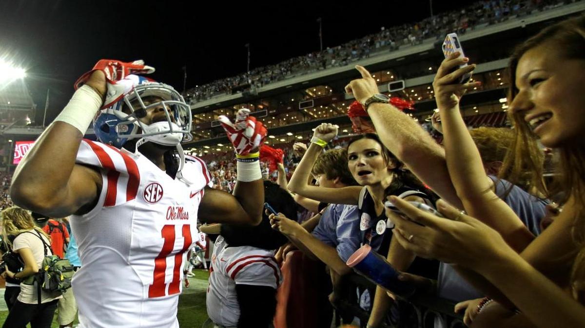 
Mississippi wide receiver Markell Pack  celebrates with fans after the Rebels beat Alabama 43-37  in Tuscaloosa, Ala., Saturday. 
