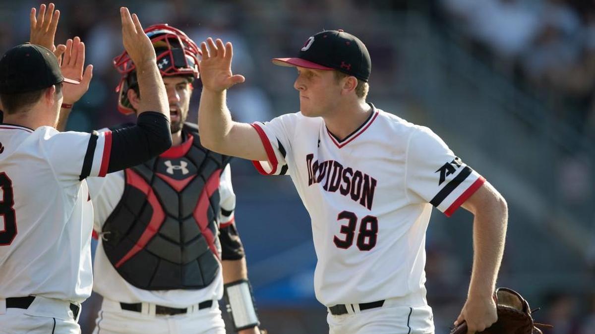 Davidson pitcher Evan Roberts (38) reacts after a strikeout of a Texas A&M batter during Saturday’s fifth inning of a super regional game in College Station, Texas. A day after a 15-inning game taxed the pitching staff, he threw 95 pitches in 7 1/3 innings, giving up 5 hits and 5 runs and striking out 5.