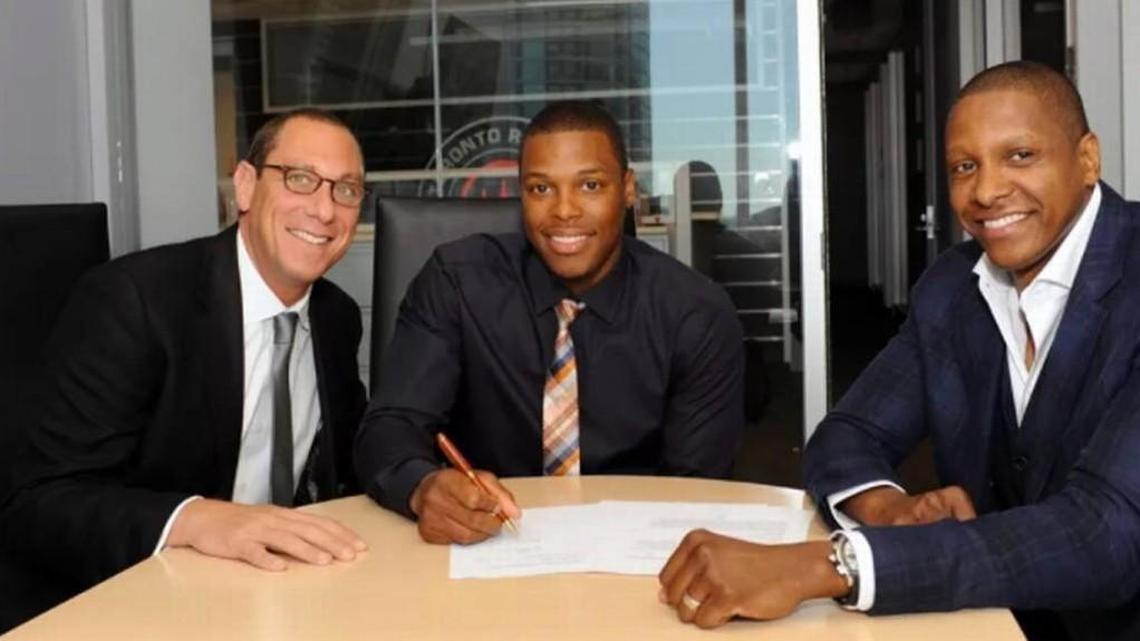 ASM Sports president Andy Miller, left, with Kyle Lowry, center, and Masai Ujiri, president of the NBA Toronto Raptors. Miller is an agent at the heart of the FBI college basketball probe.