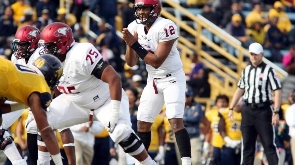 North Carolina Central freshman quarterback Chauncey Caldwell looks over the North Carolina A&T defense during the Aggies’ 24-10 win over the Eagles last Saturday in Greensboro. Caldwell should be one of nine returning starters on offense in 2018.