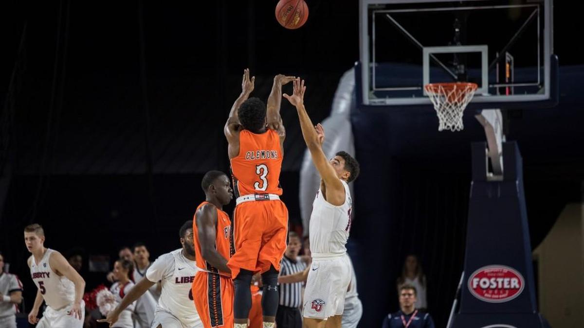 Campbell’s Chris Clemons shoots against Liberty on Tuesday. Clemons hit 10 3-pointers and scored 42 points in the Camels’ 94-85 win.