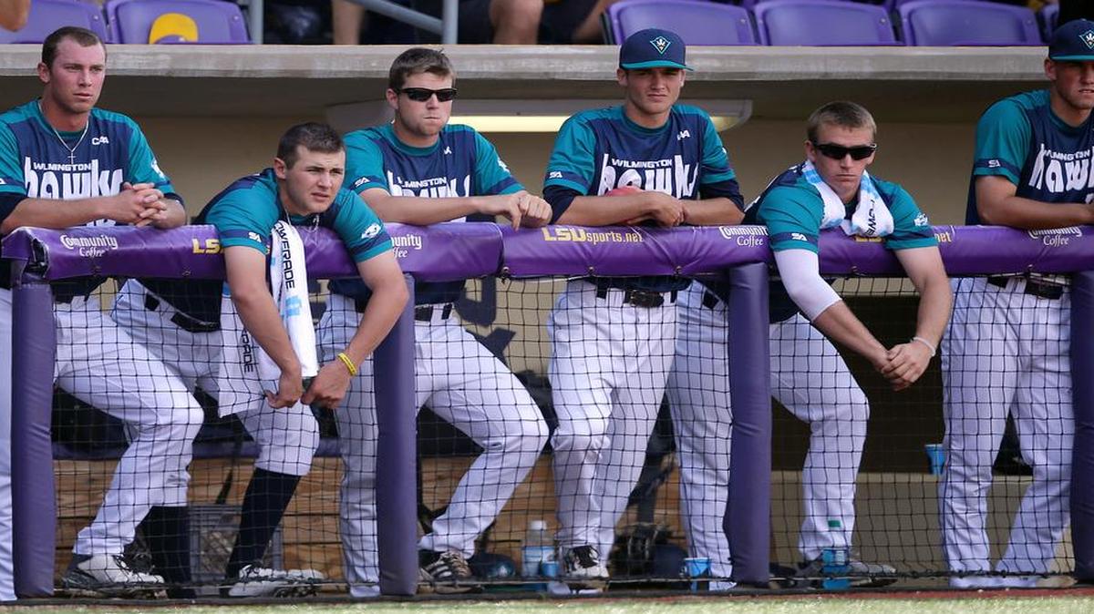 
UNC Wilmington players watch from the dugout in the ninth inning of a game against LSU at the Baton Rouge Regional of the NCAA college baseball tournament in Baton Rouge, La., Monday, June 1, 2015. LSU won 2-0 to win the tournament and advance to the super regionals. (AP Photo/Gerald Herbert)

