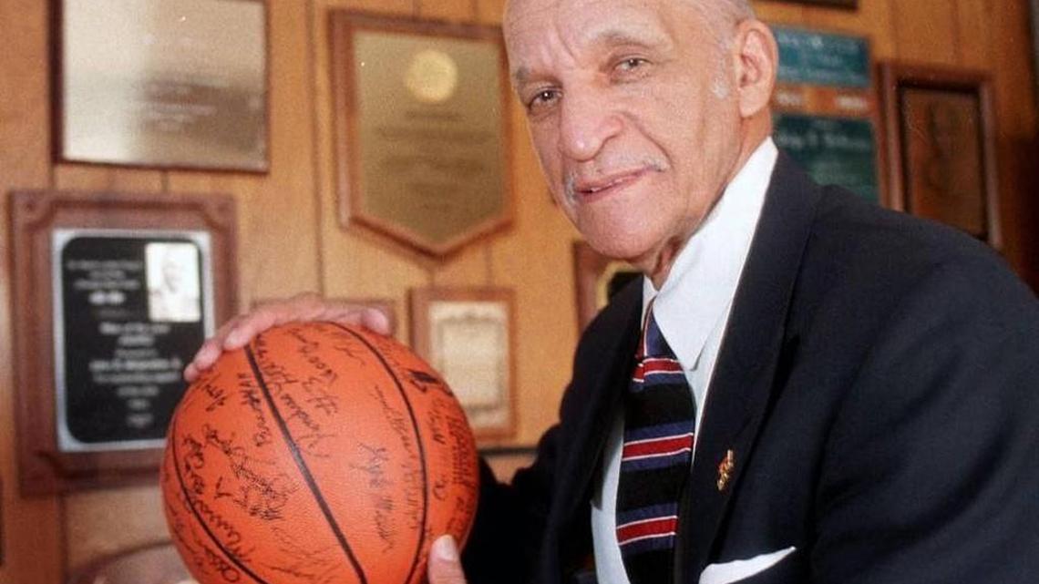 John McClendon Jr., of Cleveland Hts., Ohio, is shown at his home in 1999. McClendon was named the first black head basketball coach of a majority white college when he was named coach at Cleveland State University, in 1966. PHIL LONG 1999 AP file photo