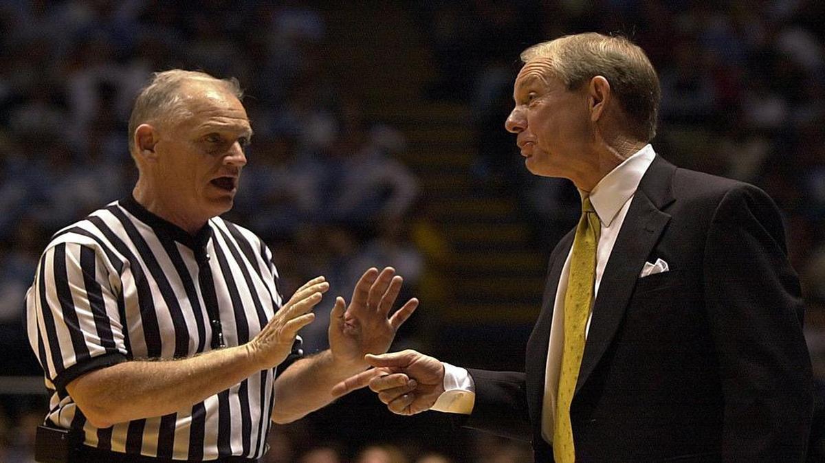 
Wake Forest coach Dave Odom questions official John Clougherty during a January 2001 game against UNC. Clougherty, who plans to retire after the 2015-16 basketball season, will be inducted into the North Carolina Sports Hall of Fame on May 15.
