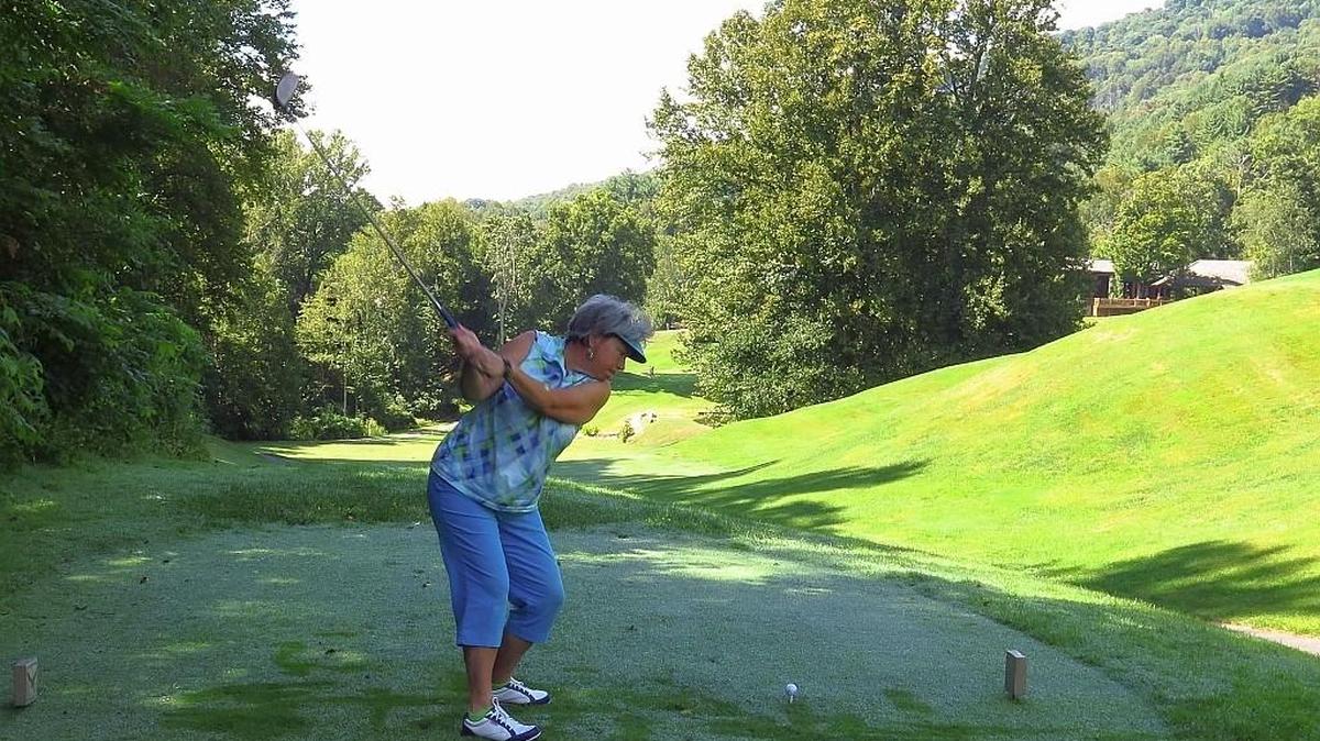 Veronica Von Zwehl tees off at Laurel Ridge Country Club in Waynesville. She made a hole in one and double eagle on the same round earlier this month.