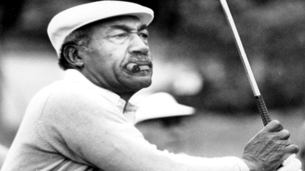
Charles Sifford plays during the Johnny Mathis Senior golf tournament at MountainGate in March 1986. Sifford died Tuesday, Feb. 3, 2015. He was 92. 
