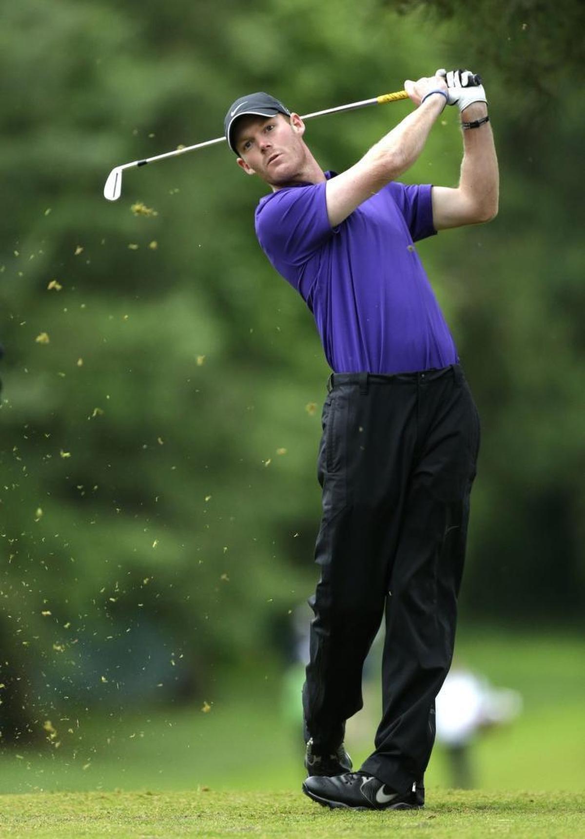 Grayson Murray tees off during the first round of the U.S. Open golf tournament at Merion Golf Club on June 14, 2013, in Ardmore, Pa. (AP Photo/Julio Cortez)
