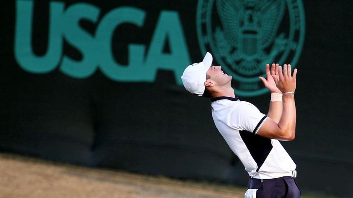 Golfer Martin Kaymer of Dusseldorf, Germany reacts after sinking a putt on the 18th hole clinching the 2014 U.S. Open at Pinehurst No. 2 on Sunday, June 15, 2014 in Pinehurst.