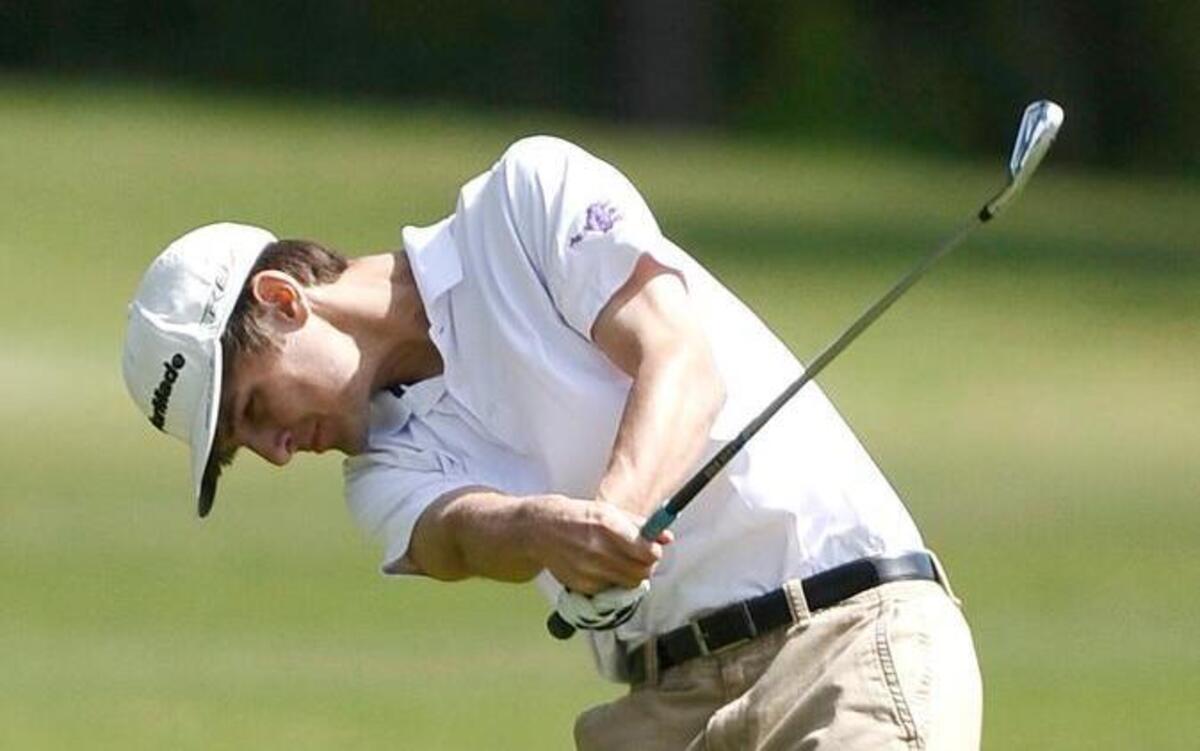 
Corinth Holders’ Monty Fields hits an approach shot from the fairway during the Pirates’ win at Reedy Creek Golf Course on Monday.
