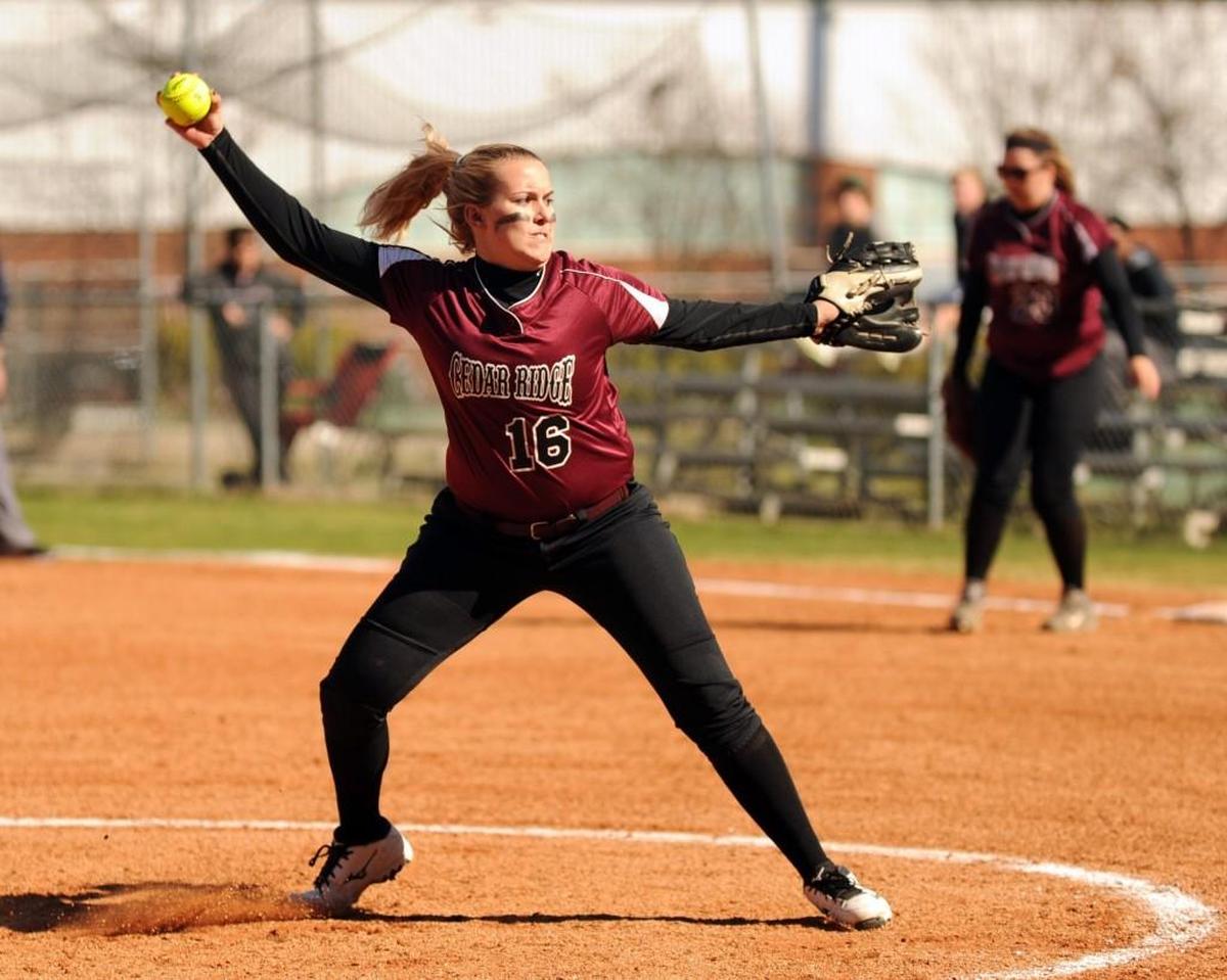 Cedar Ridge's Rivers Andrews pitches to Cardinal Gibbons during the girls softball game, which was played on Monday, March 21, 2016. Cedar Ridge won 15-0.