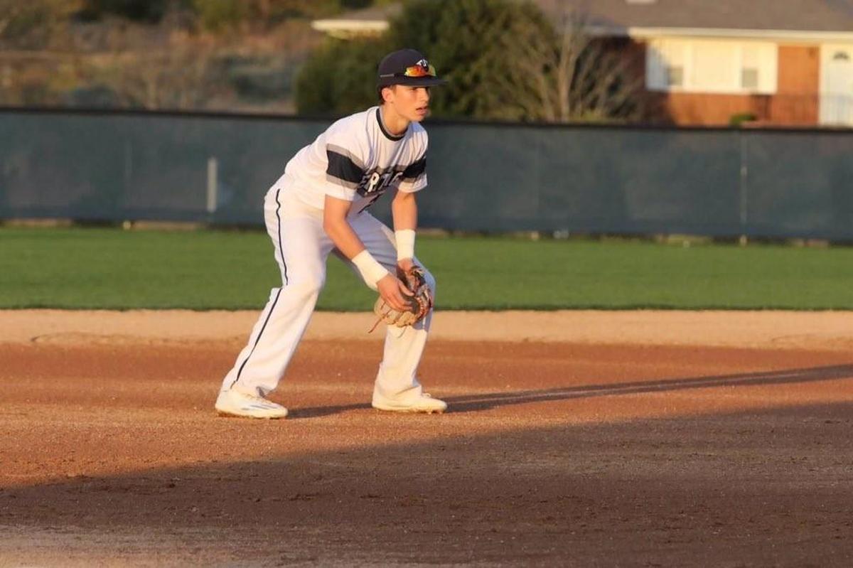 Thayer Thomas warms up before a Heritage High baseball game in 2017. The NC State football/baseball player was taken in the 33rd round of the MLB draft by the Boston Red Sox on Wednesday, June 5, 2019.