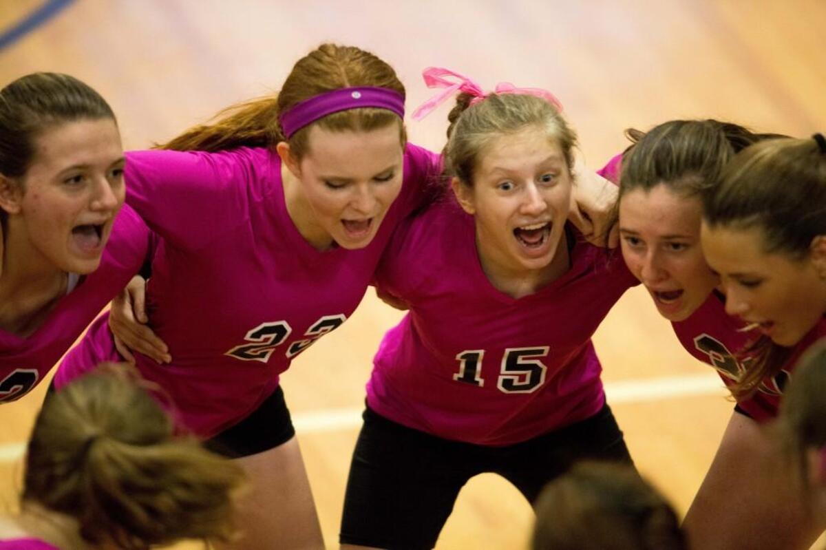 The Franklin Academy Volleyball team huddles prior to a game against Voyager Academy in Wake Forest, N.C. on Thursday, Oct. 6, 2016.