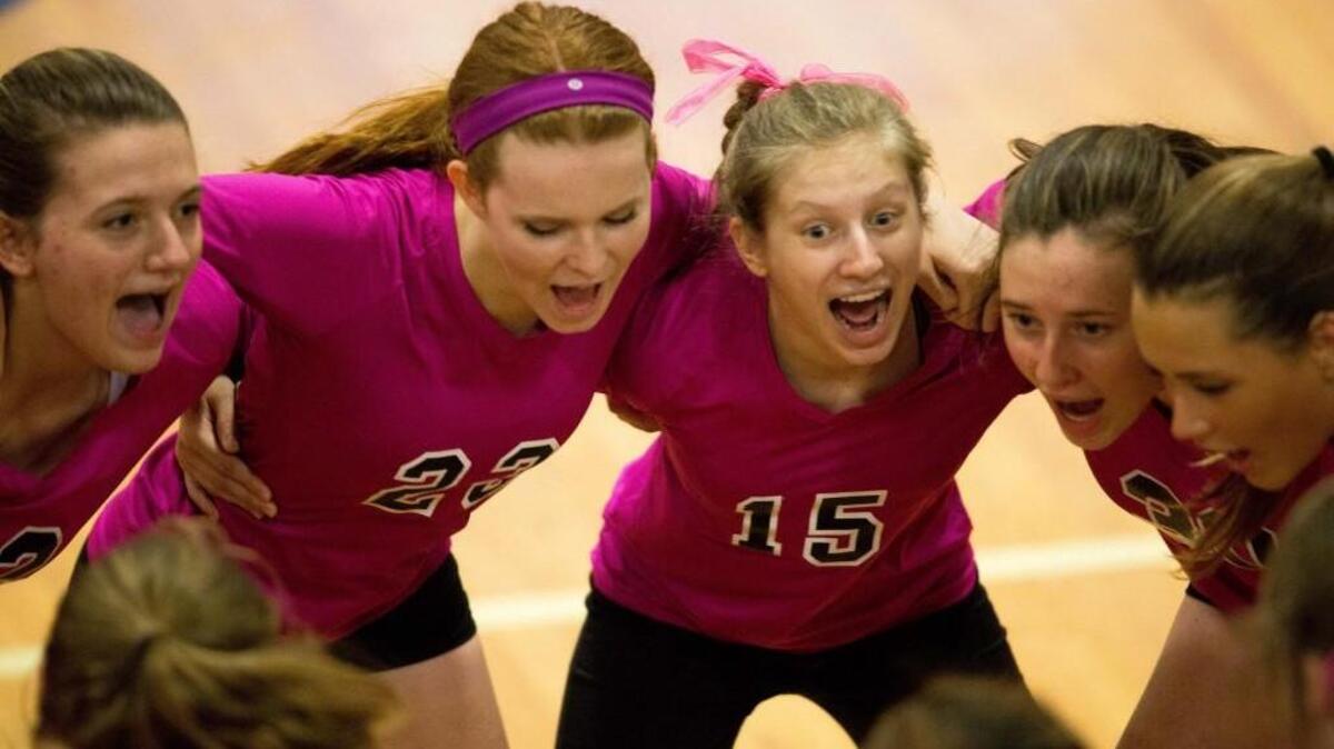 The Franklin Academy Volleyball team huddles prior to a game against Voyager Academy in Wake Forest, N.C. on Thursday, Oct. 6, 2016.