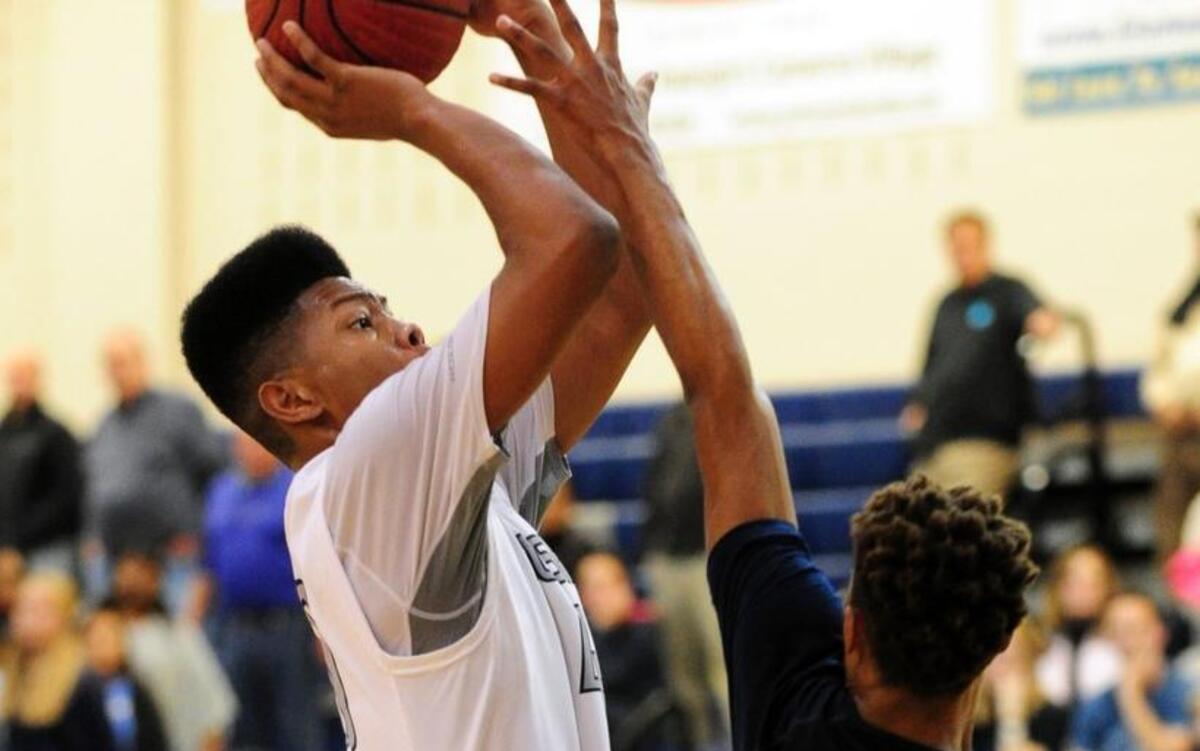 Heritage sophomore forward Jayden Gardner, left, was named the Cap-8 boys’ co-player of the year.