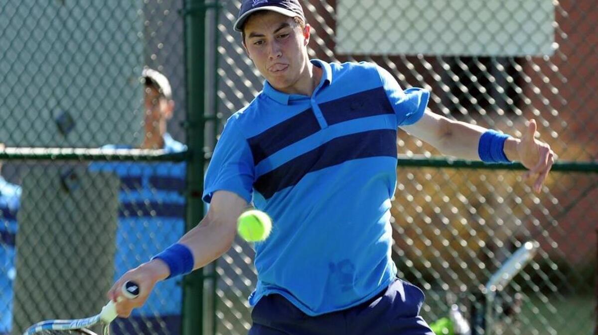 Panther Creek enters the postseason as the No. 1-ranked team in the state. Panther Creek's Andrew Pickens hits at the baseline during the boys tennis match against Middle Creek, which took place in Cary on Monday, April 4, 2016.