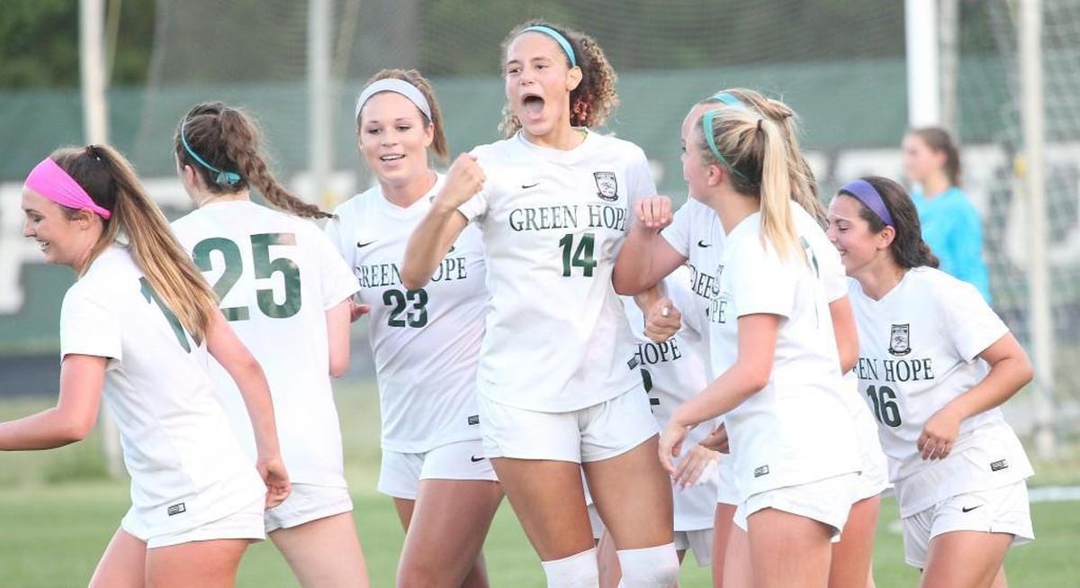 Green Hope's Izzy Brown (14) is all pumped up after her score during the Leesville Road high school soccer match with Green Hope high school in the third round of the state high school playoffs at Cary N.C. on May 16, 2017. Green Hope won 5-0.
