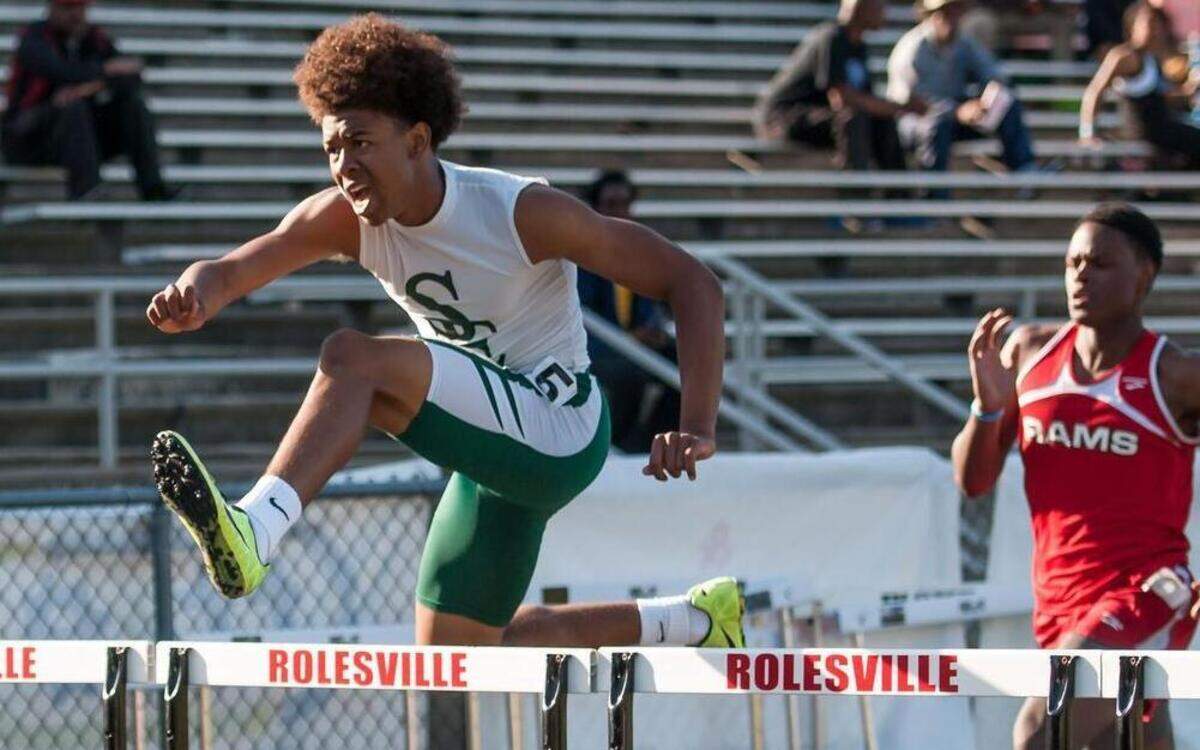 
South East Raleigh High School’s Dominc Foy in the Boys 300 meter hurdles during the Greater Neuse River Conference Outdoor Track and Field on Thursday, April 23, 2015 in Garner, N.C. South East Raleigh High School Boys and Girls won.

