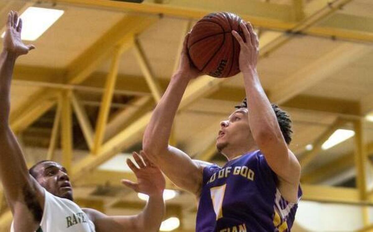 Word of God’s Jaylen Fornes (1) goes up for a shot as Ravenscroft’s Ian Dubose (35) defends during their game in Raleigh on Wednesday, Feb. 3, 2016. Word of God defeated Ravenscroft 77-68.