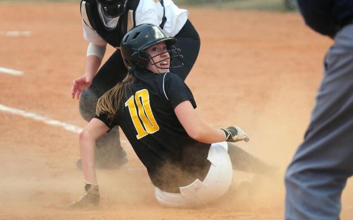 Apex softball swinging the bats well, and when it matters most