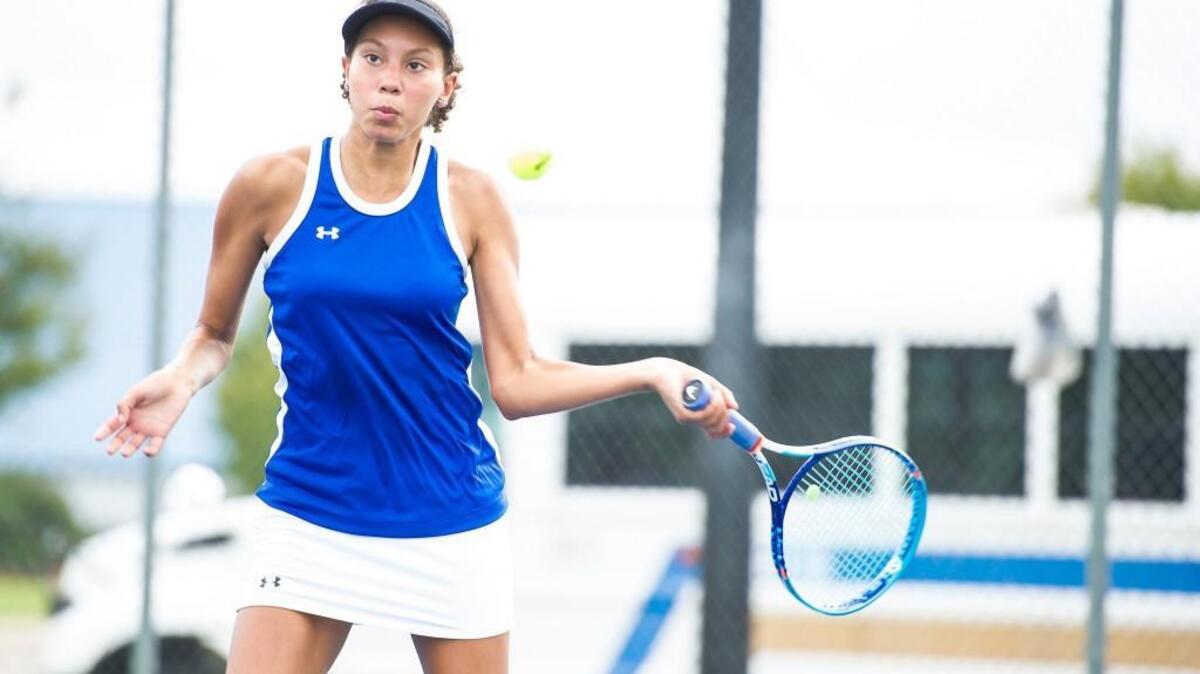 
Clayton’s Carmelle Joyner hits the ball during a match against West Johnston earlier this season. She became a three-time Greater Neuse River 4A Conference singles champion on Thursday.
