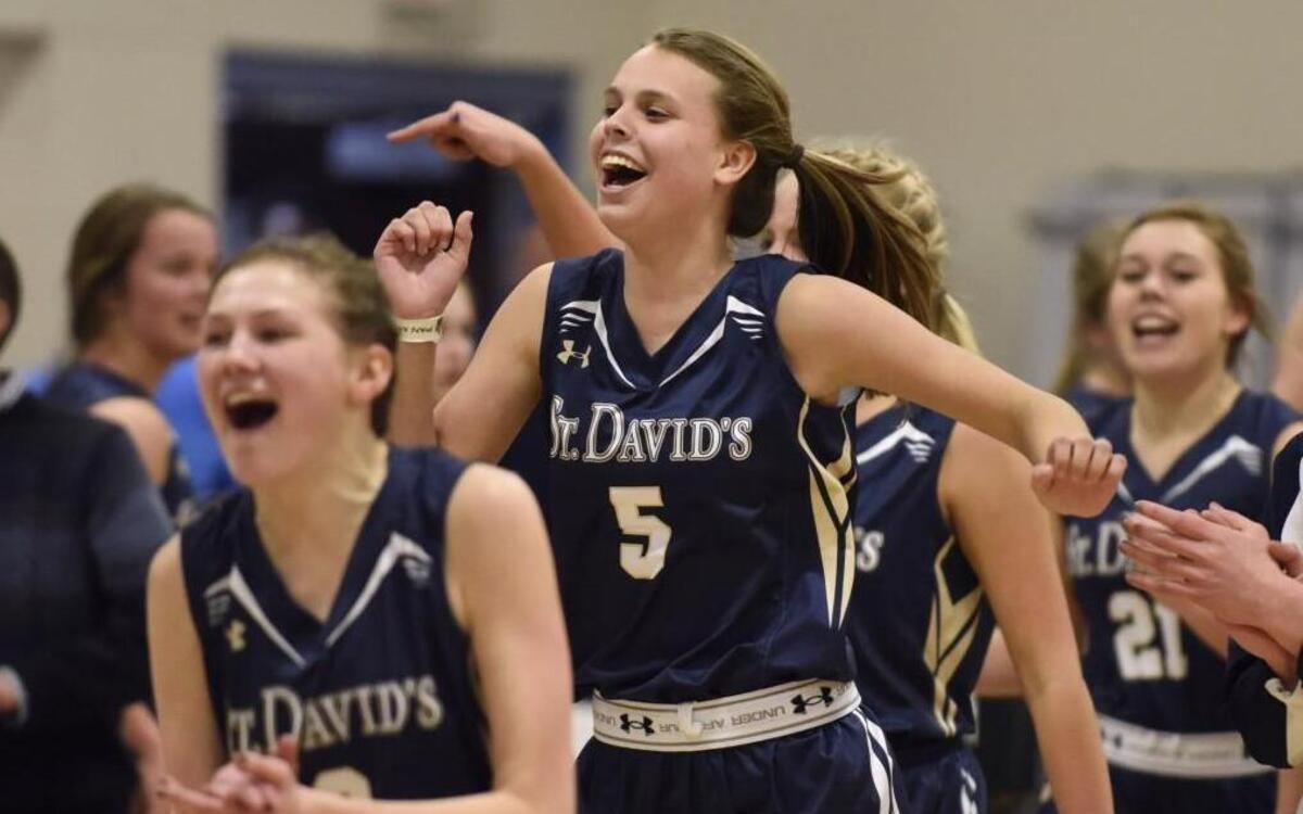 St. David's Abigail McClatchey (5) celebrates their win over Cary Christian in the Eastern Plains Independent 2A Conference Championship in Raleigh, N.C. on Friday, February 12, 2016. The St. David's Warriors beat the Cary Christian Knights 62-59.